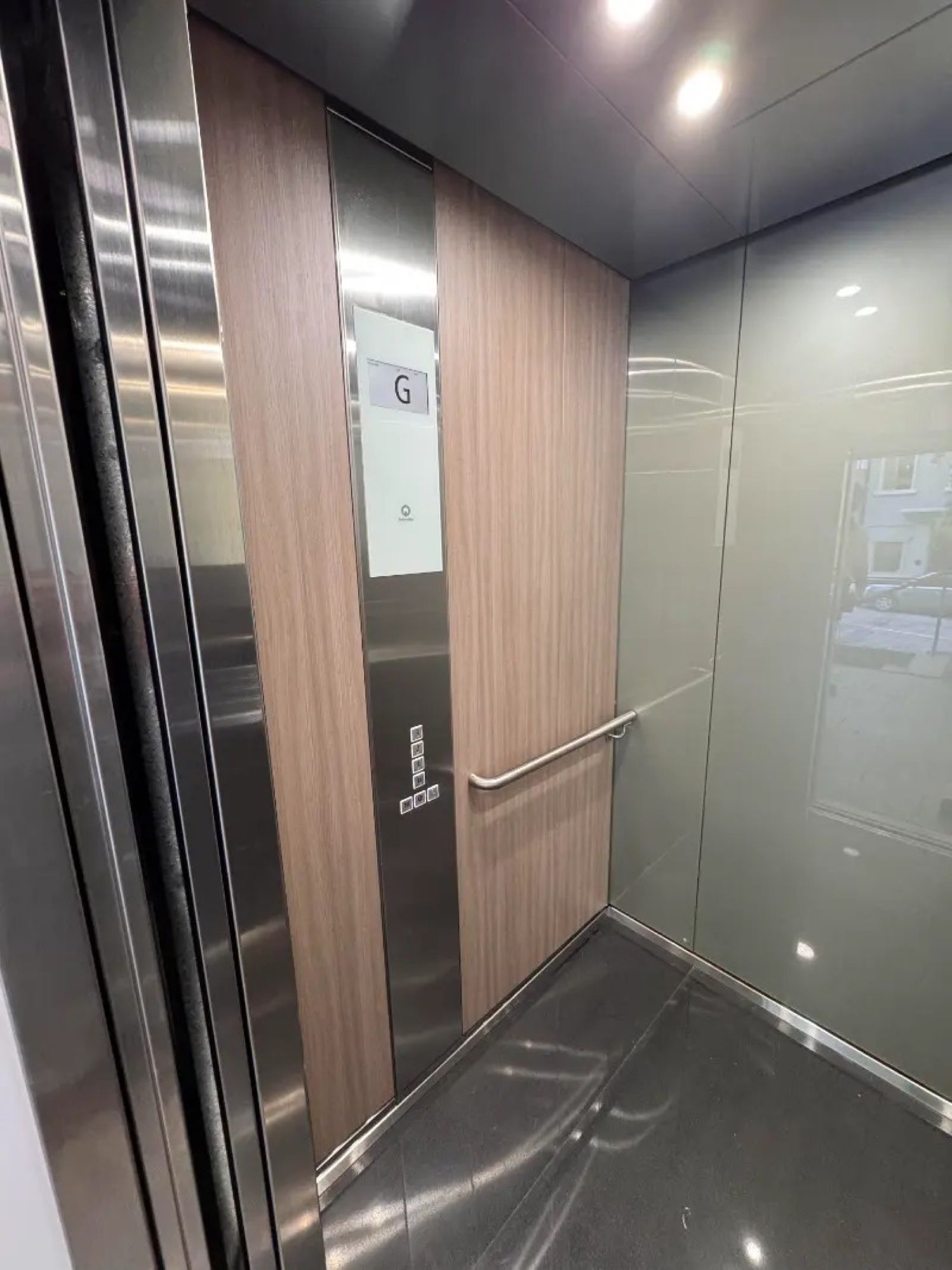 After: Lift car, stainless to walnut woodgrain