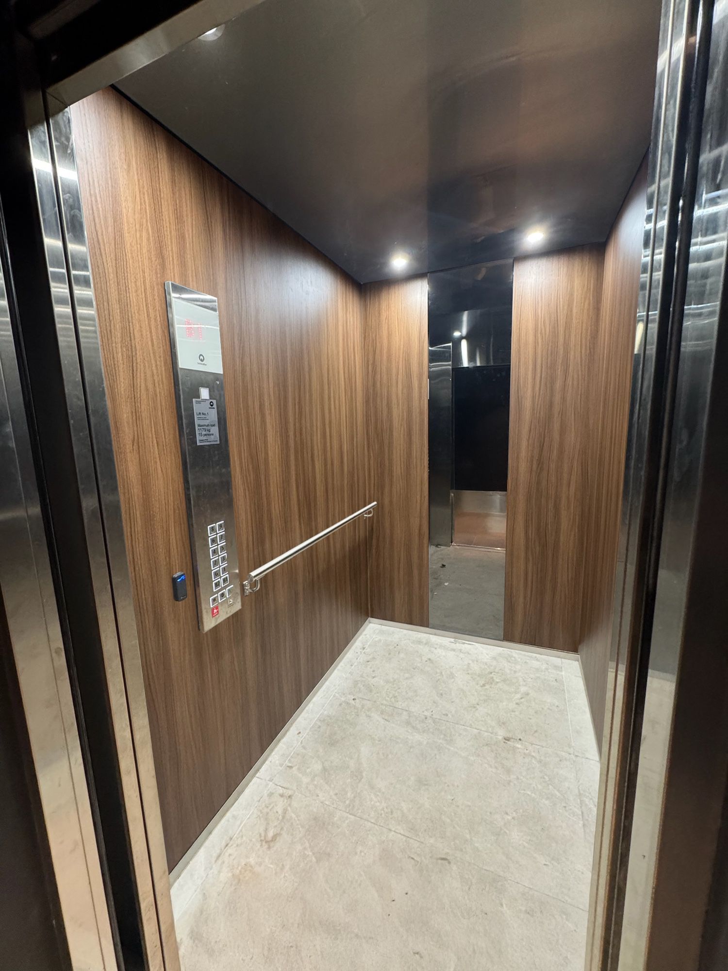 After: Lift car, stainless to walnut woodgrain