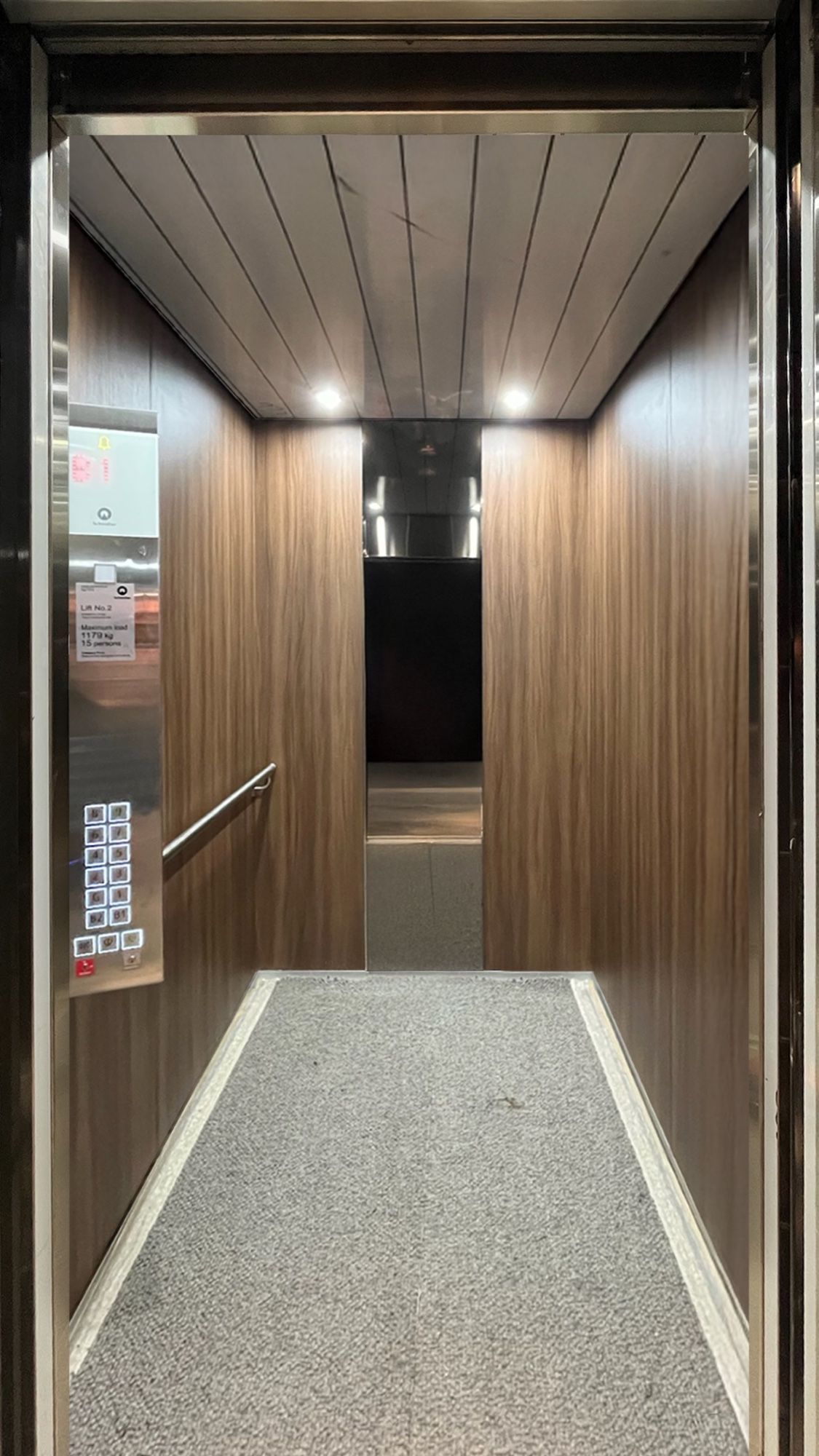 After: Lift car, stainless to walnut woodgrain