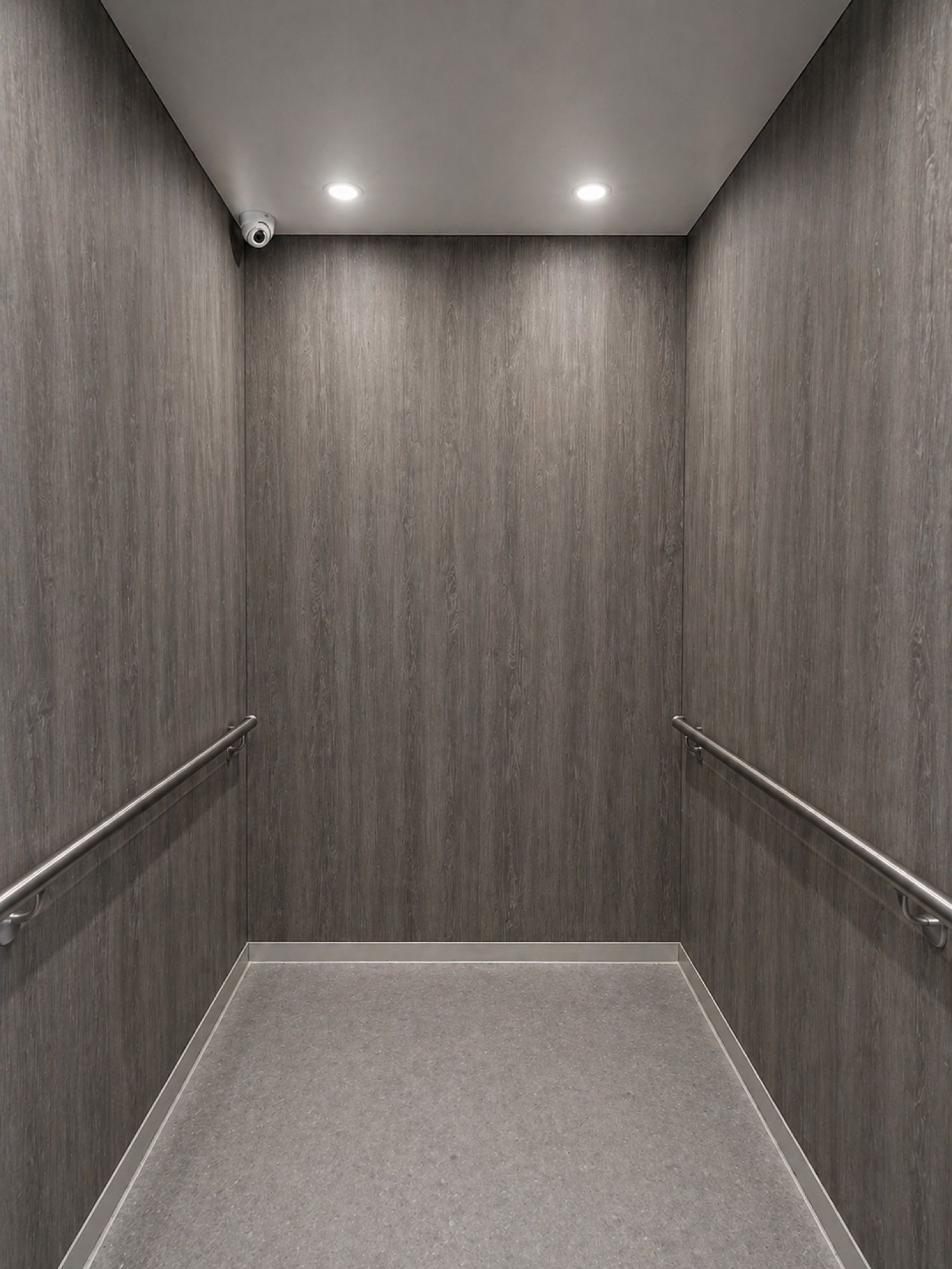 After: Lift car, stainless to dark woodgrain